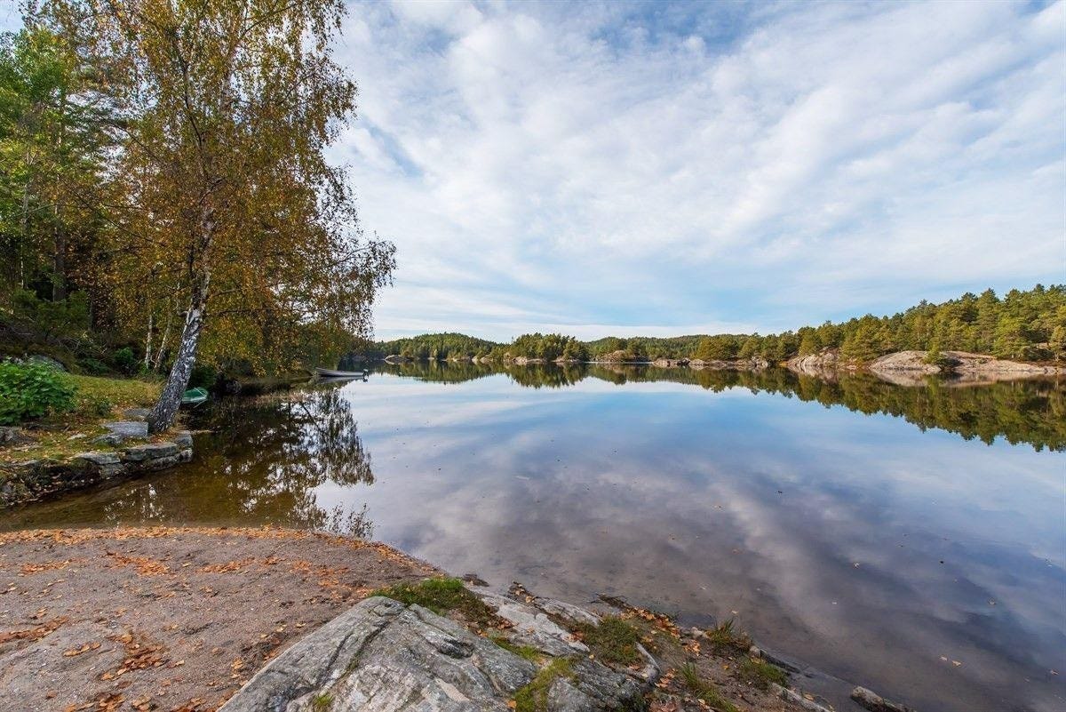 Skarvann, flott badevann her er det mange øyer å utforske Galleribilde
