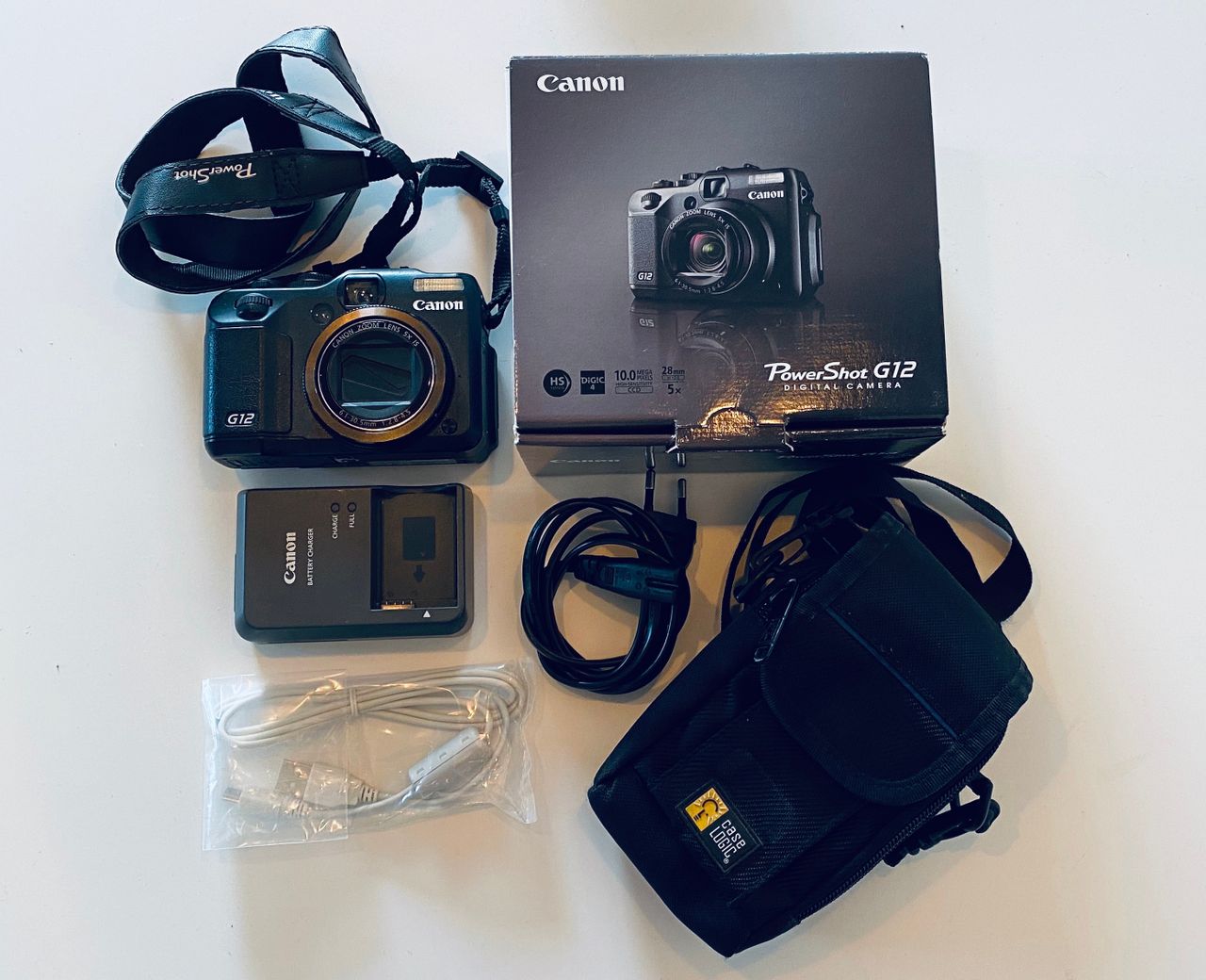 Pent brukt Canon PowerShot G12 med kameraveske | FINN.no Canon PowerShot G12 Batteri & Lader