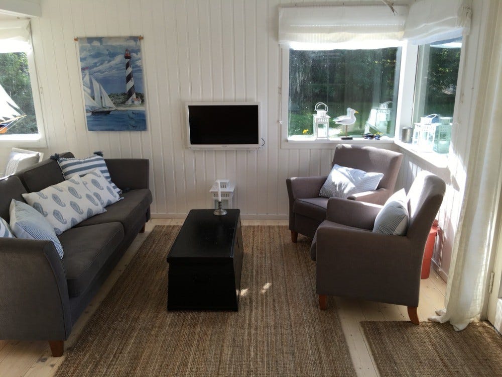 Koselig sofakrok med TV. Galleribilde