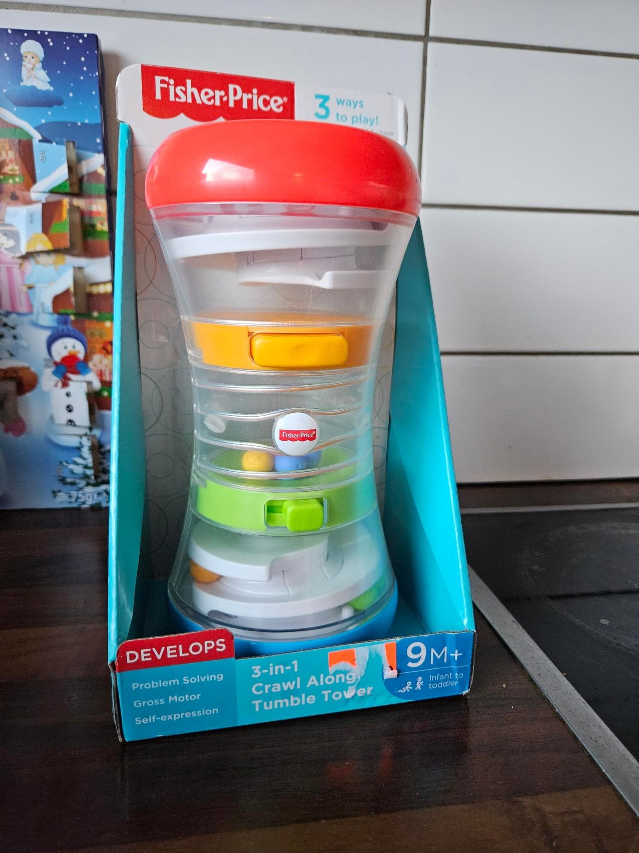 Fisher price 3 in 1 crawl hot sale along tower