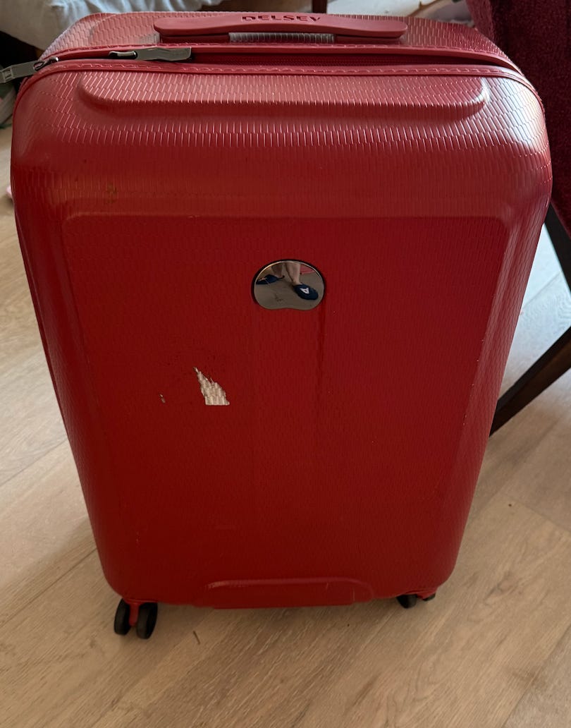Red Delsey suitcase | FINN-torget