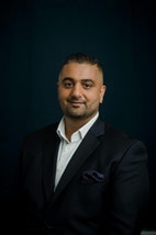Bilde av megler Usman Ahmed
