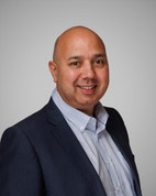 Bilde av megler Rizwan Malik