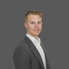 Bilde av megler Tage Helle