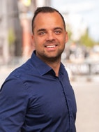 Bilde av megler Kristoffer Munksgaard