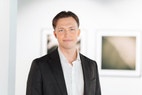 Bilde av megler Mathias Helland Bøstrand