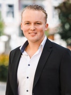 Bilde av megler Julius Bach Akerholt
