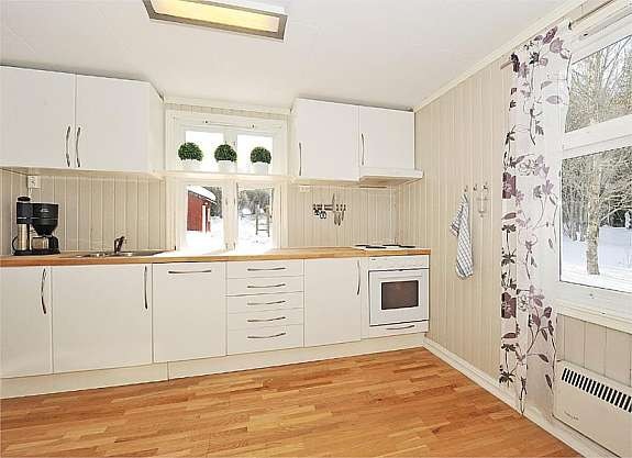 Kjøkkenet sett fra spisestuen Galleribilde