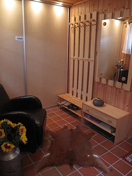 Garderobe ved inngang Galleribilde