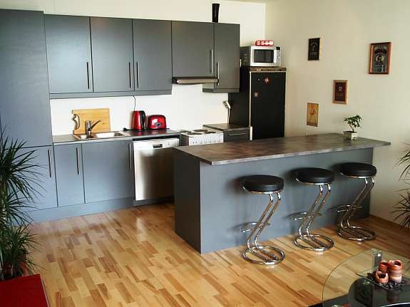 Åpen kjøkkenløsning i stuen. Galleribilde