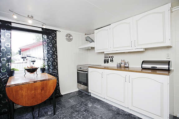 Trivelig spiseplass ved vinduet Galleribilde