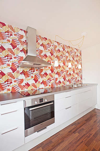 Lekkert kjøkken fra 2009, med integrerte hvitevarer. Galleribilde