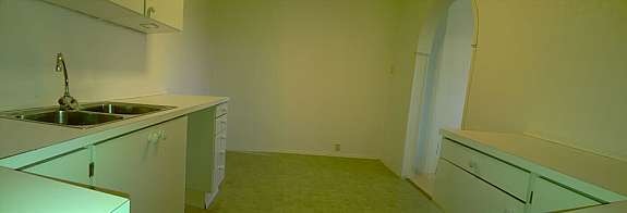 Kjøkken sett fra komfyrens plass. Galleribilde