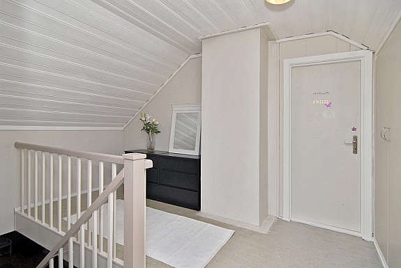 Koselig trapperom i loftsetasjen. Galleribilde