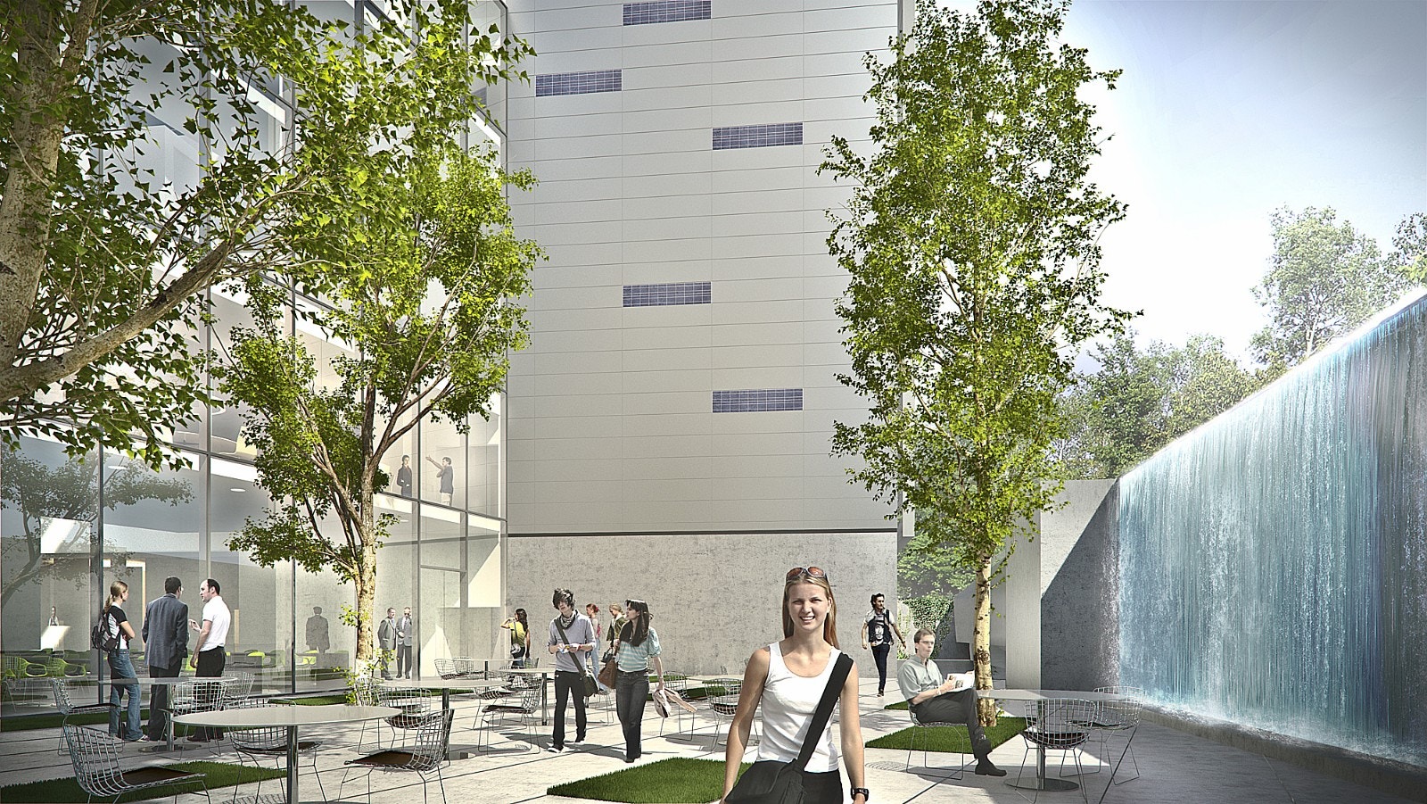 Gårdshage på baksiden av bygget. Vannfallet drives av solceller i byggets fasade. Galleribilde