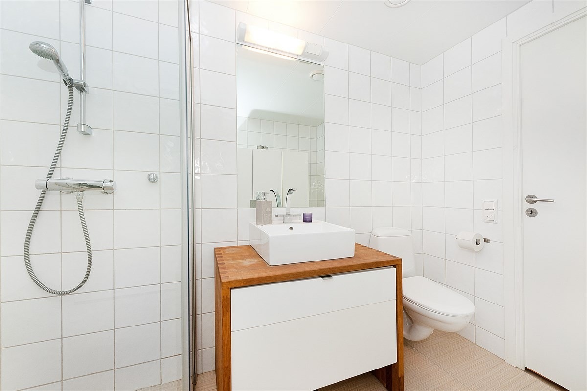 Baderom med opplegg for vaskemaskin Galleribilde