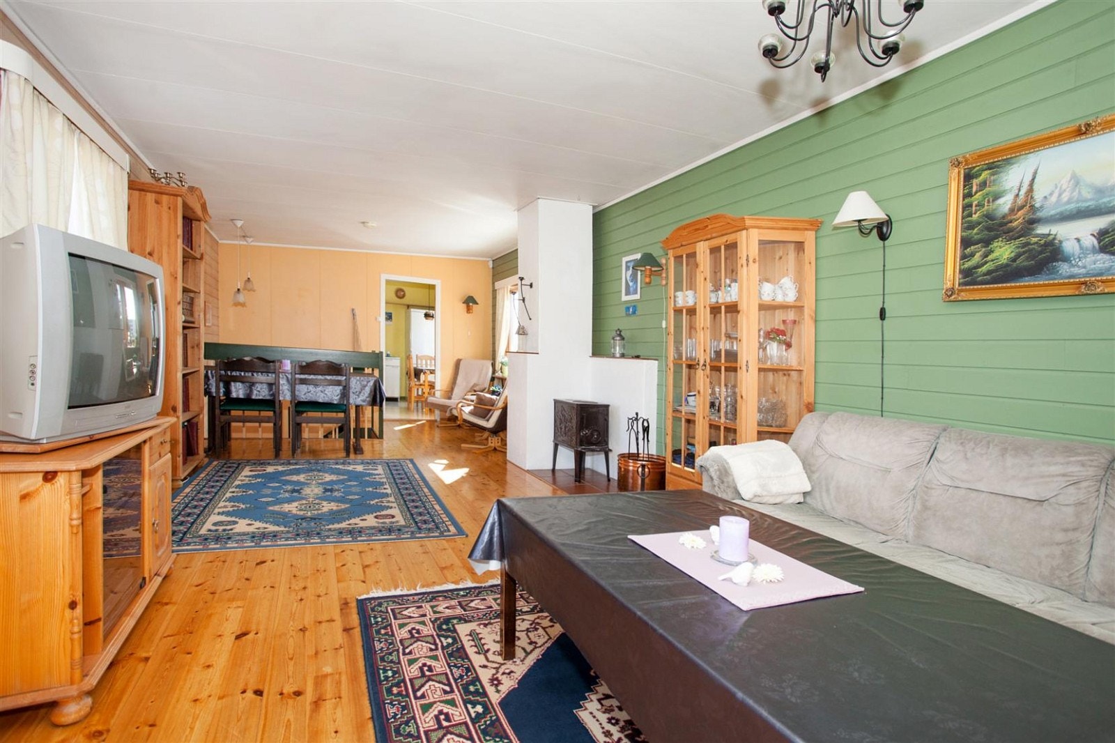 Vedovn i stuen. Galleribilde