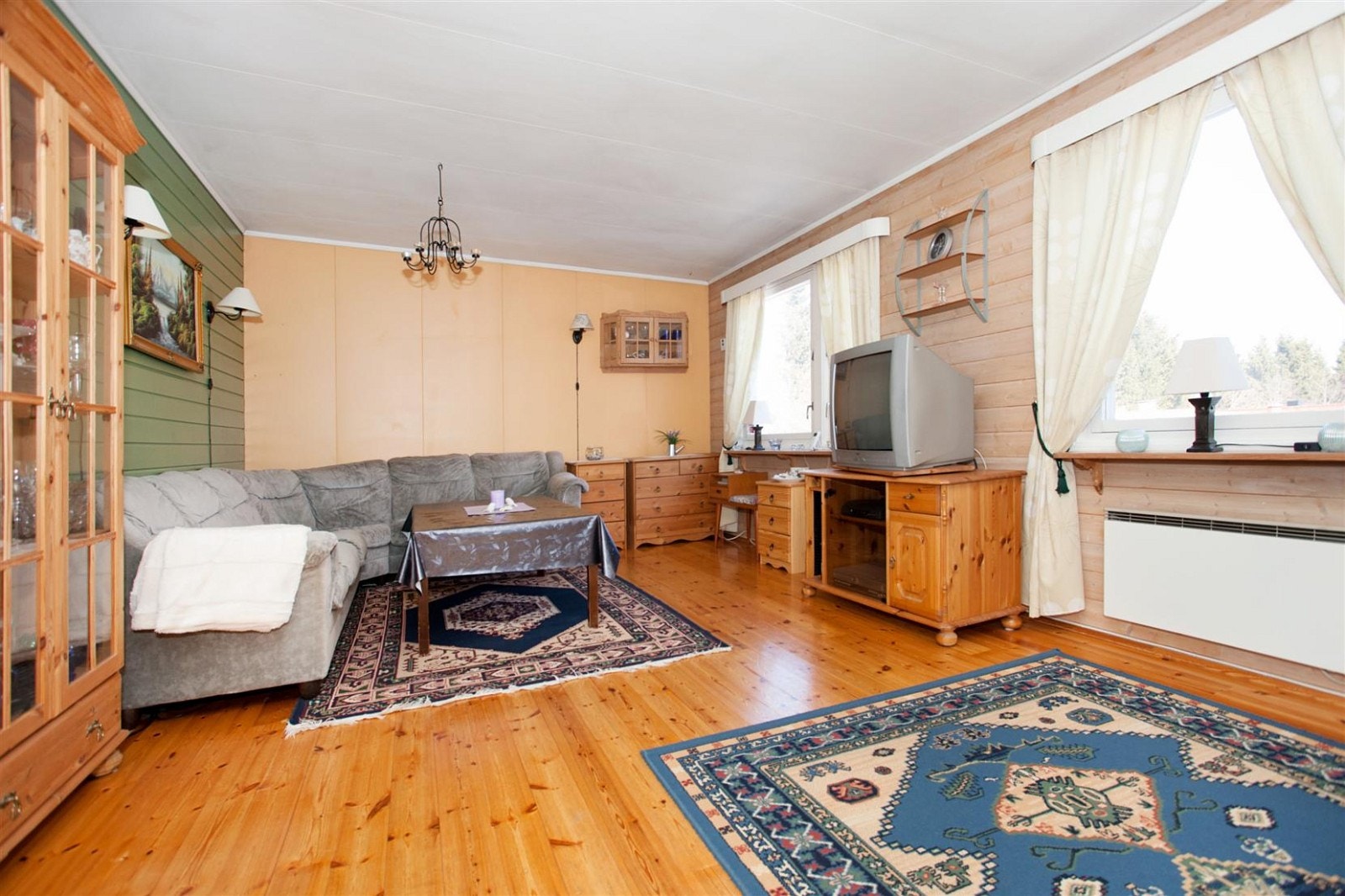 Vedovn i stuen. Galleribilde