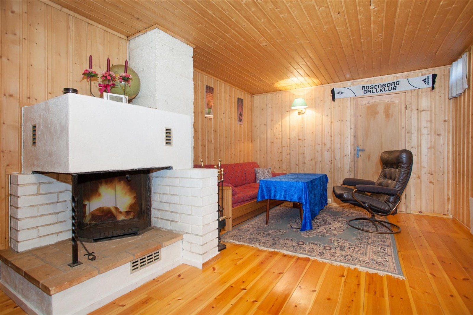 Vedovn i kjellerstuen. Galleribilde