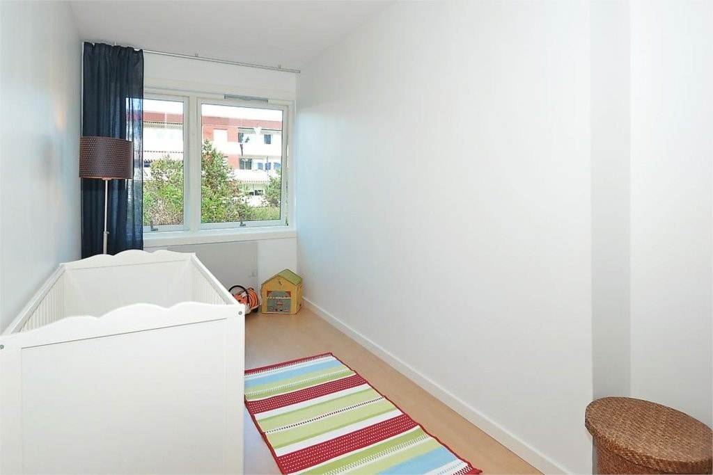 Lyst og koselig soverom. Galleribilde