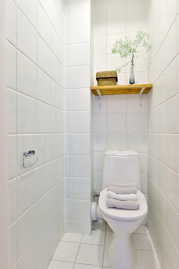 Pent flislagt toalett Galleribilde