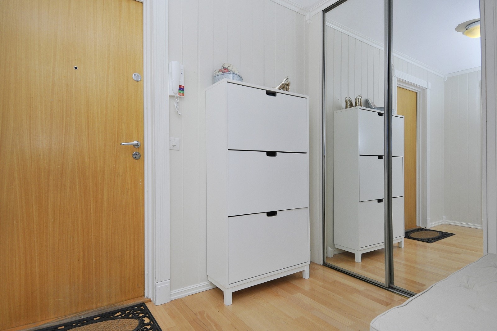 Entré med garderobe Galleribilde