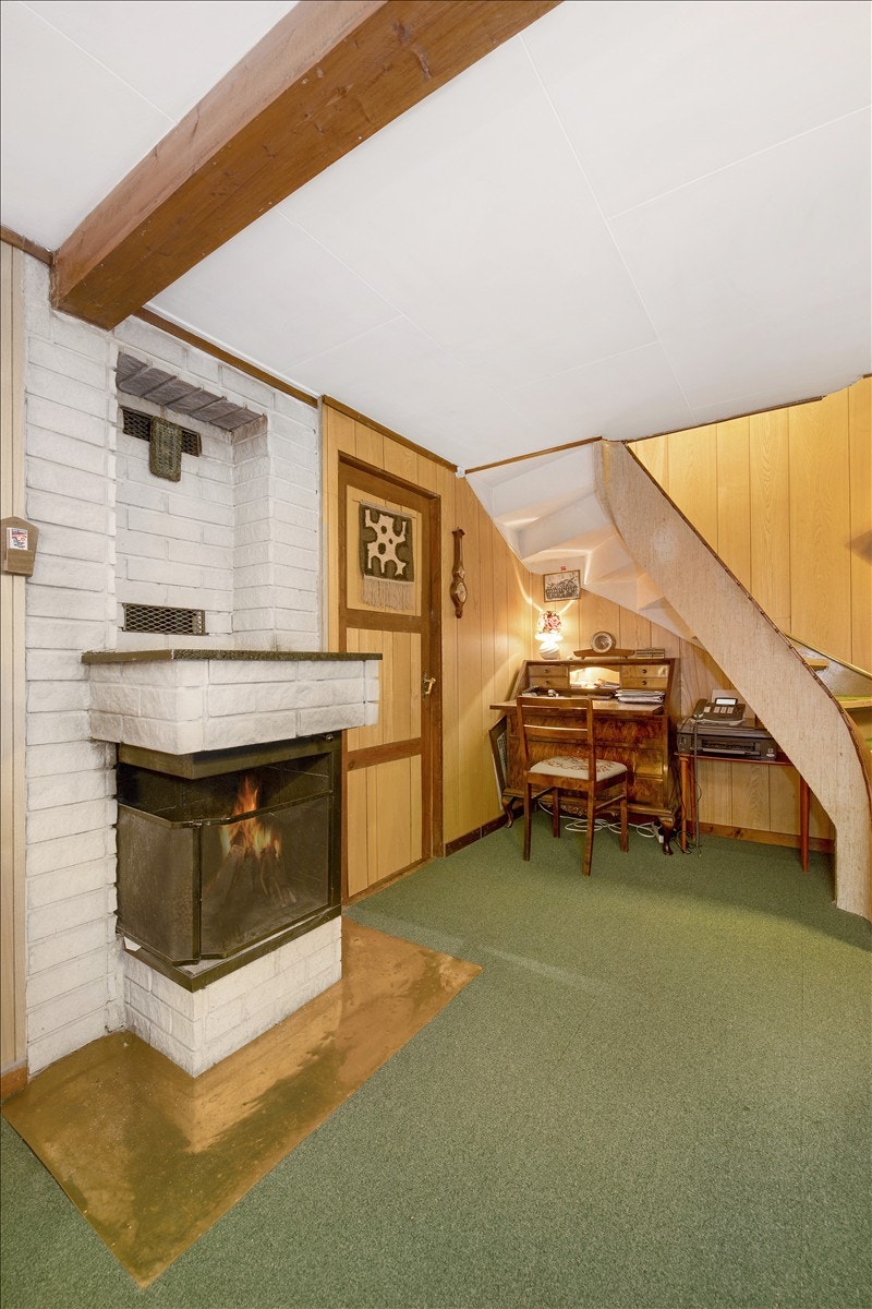 Peisovn i kjellerstue - dør inn til bodrom Galleribilde
