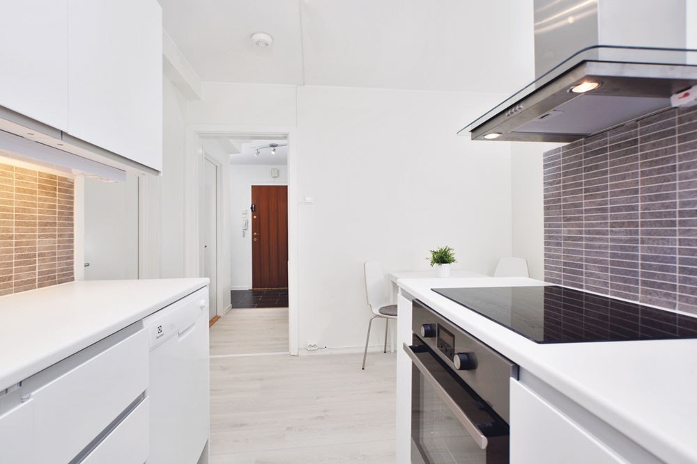 Nytt kjøkken med spiseplass Galleribilde