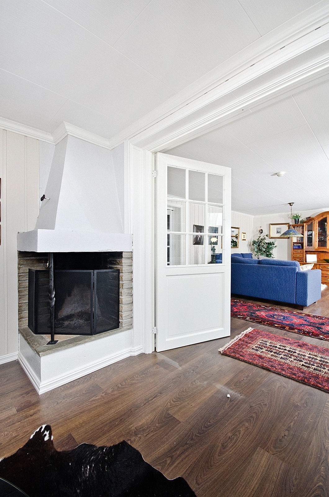 Åpen peis i stuen. Galleribilde