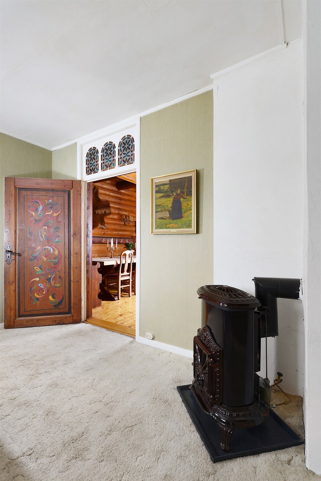 Stue med parafinovn i 1.etg. Galleribilde