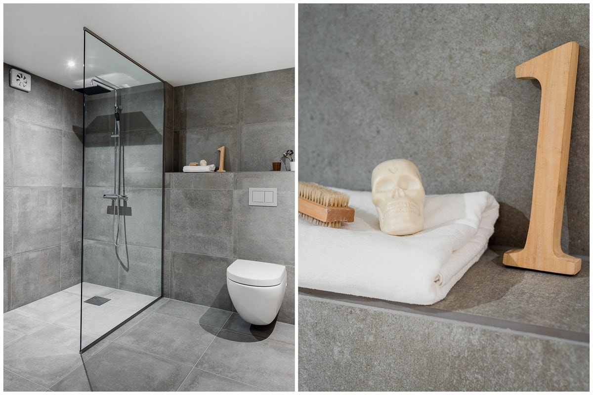 Badet er langt på vei likt innredet som badet i andre etasje, dog med gråtonede veggfliser for variasjon. Galleribilde