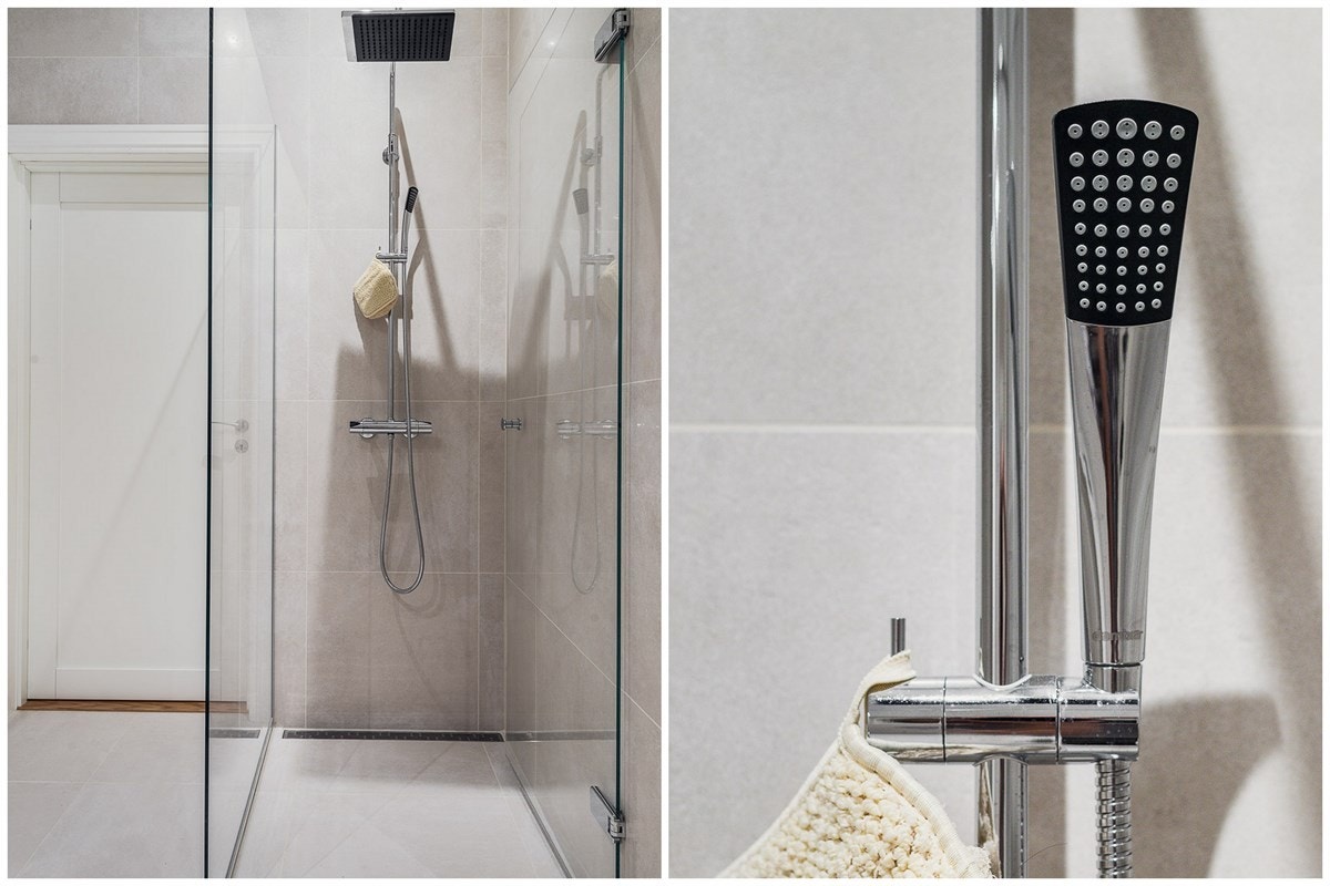 Dusjhjørnet har en moderne, delvis åpen form med fast skjermvegg i glass og Damixa blandebatteri med både regndusj og hånddusj. Galleribilde