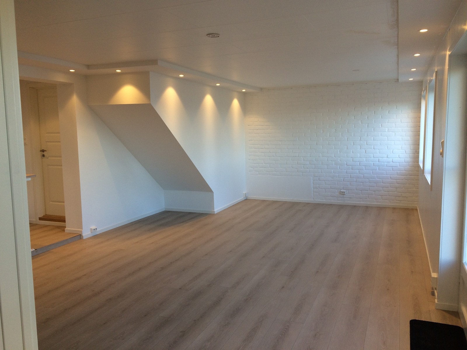 Stue med teglsteinvegg Galleribilde