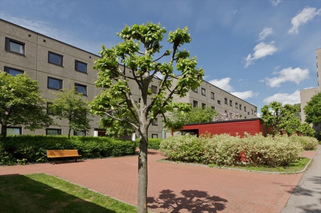 Sommerbilde av borettslagets fellesområde. Galleribilde