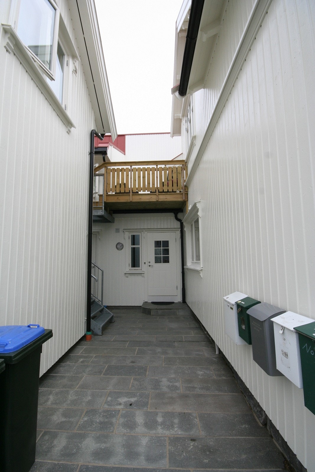 Gårdsrom/inngang til eiendommen i 1. etg. Galleribilde