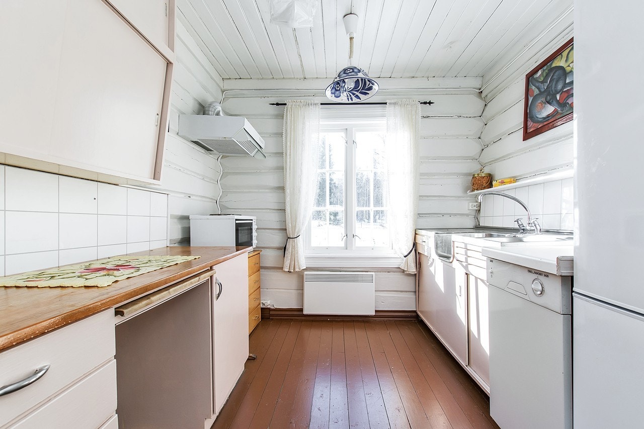 Kjøkkenet i drenehuset holder en eldre standard Galleribilde