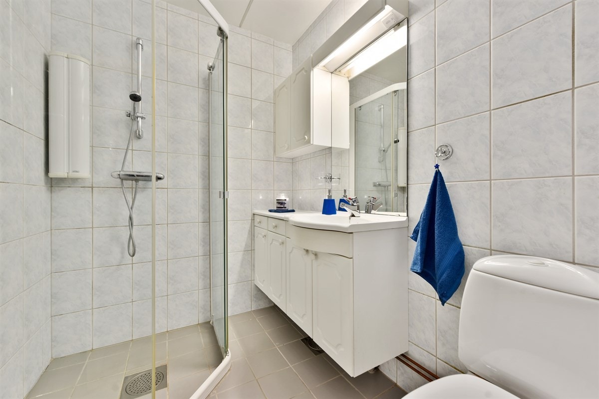 Flislagt bad med gulvvarme Galleribilde