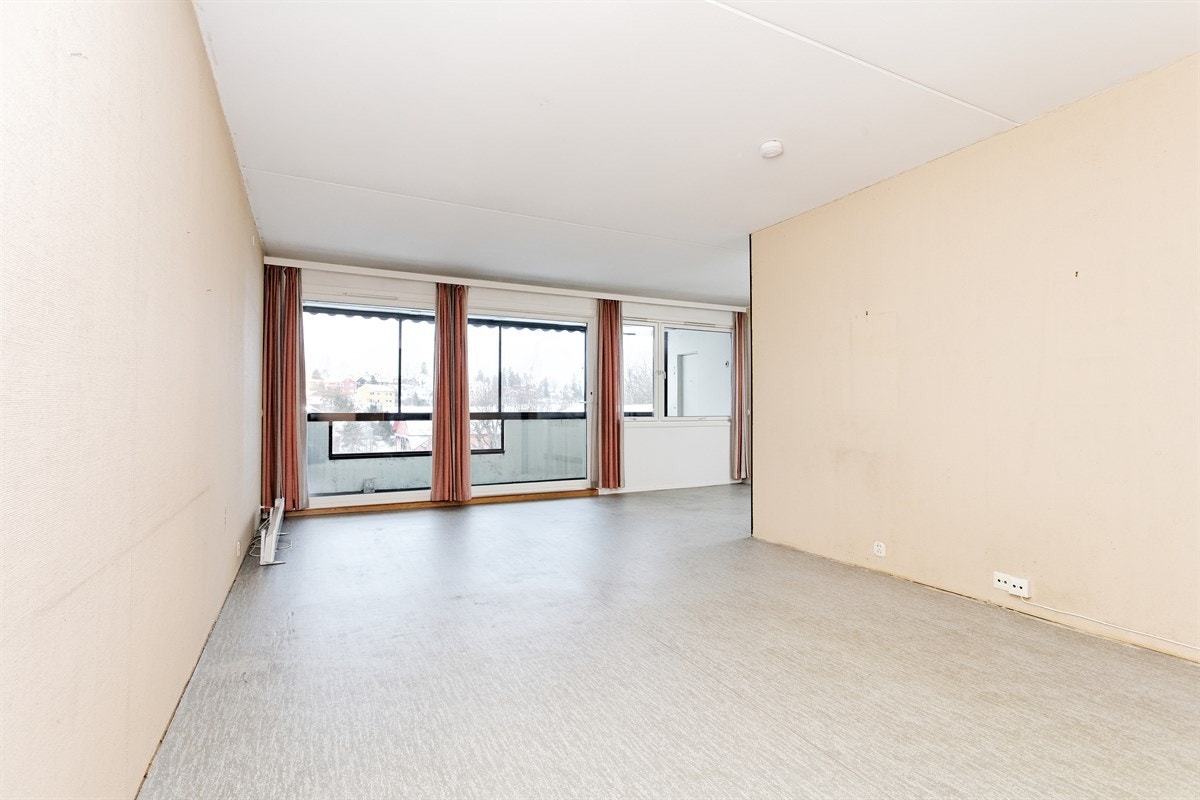 Leilighetens romslige stue Galleribilde