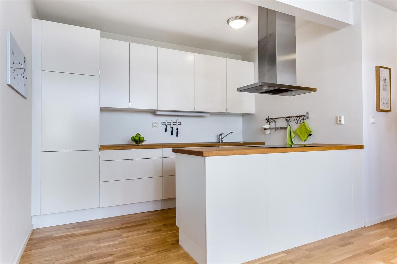 Her er det hyggelig å stå og kokkelere til middagsgjester Galleribilde