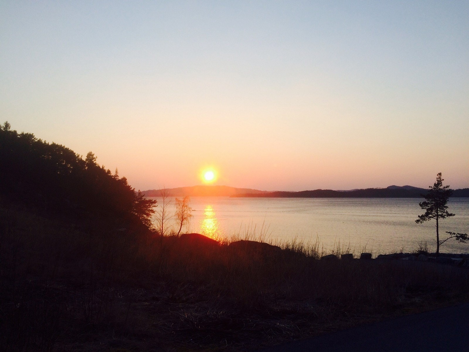 Solnedgang fra tomtene 16 mars Galleribilde