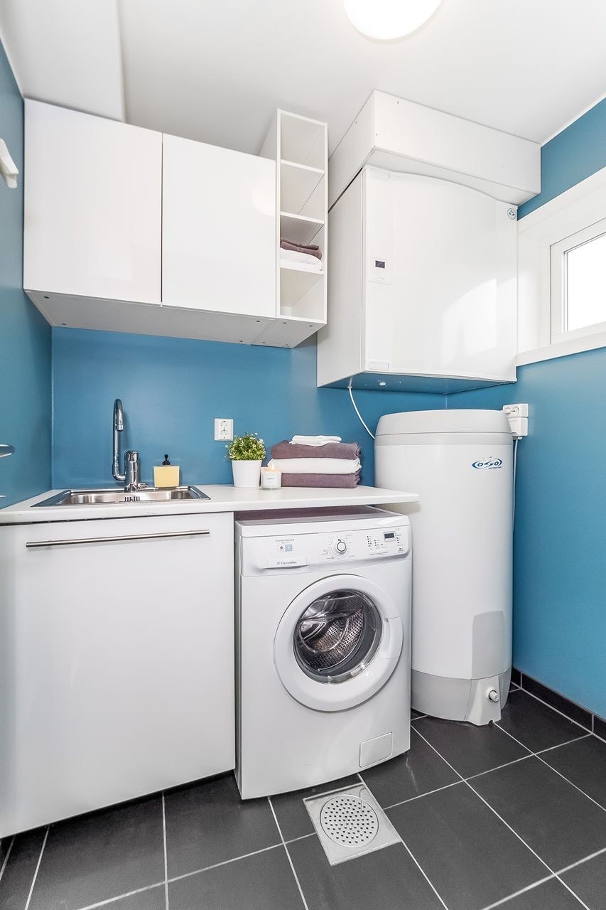 Boligen kan også by på et utrolig praktisk vaskerom Galleribilde