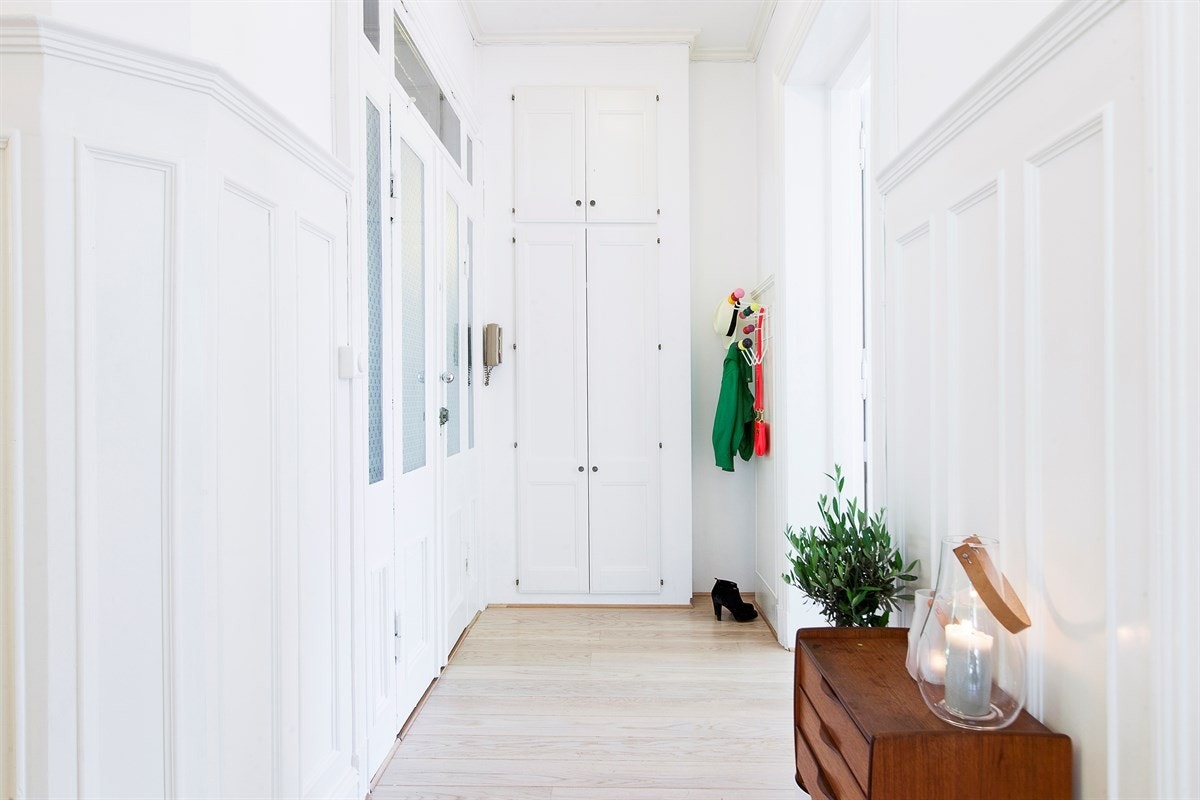 Hyggelig gang/entre som ønsker deg velkommen hjem og gir et godt førsteinntrykk av leiligheten Galleribilde