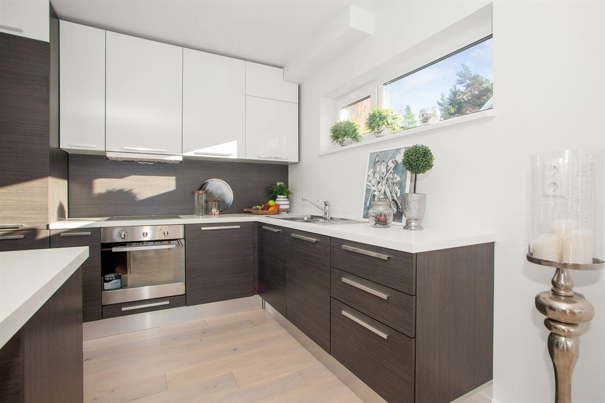 Lekker kjøkken med alt av integrerte hvitevarer Galleribilde