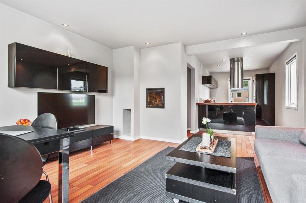 Åpen løsning mellom stue og kjøkken. Galleribilde