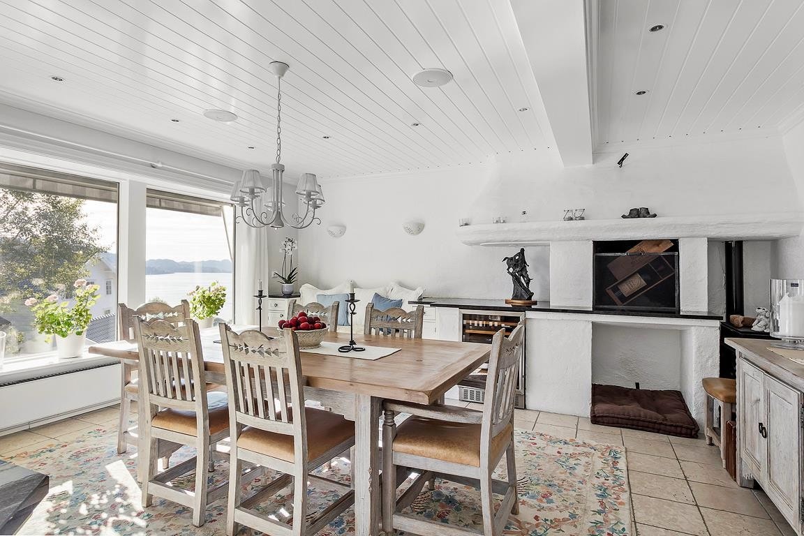 Kjøkkenet er boligens hjerte - her får man lyst å tilbringe tid Galleribilde