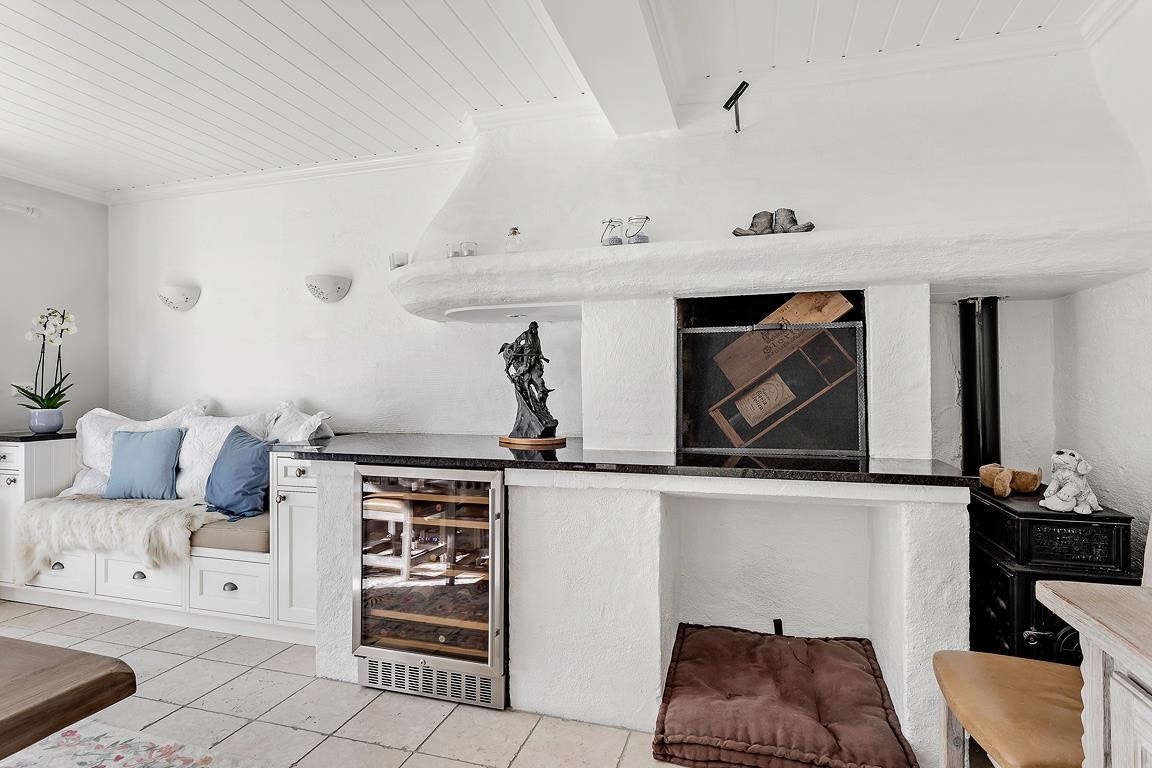 En god flaske vin eller fyr i peisen? Galleribilde