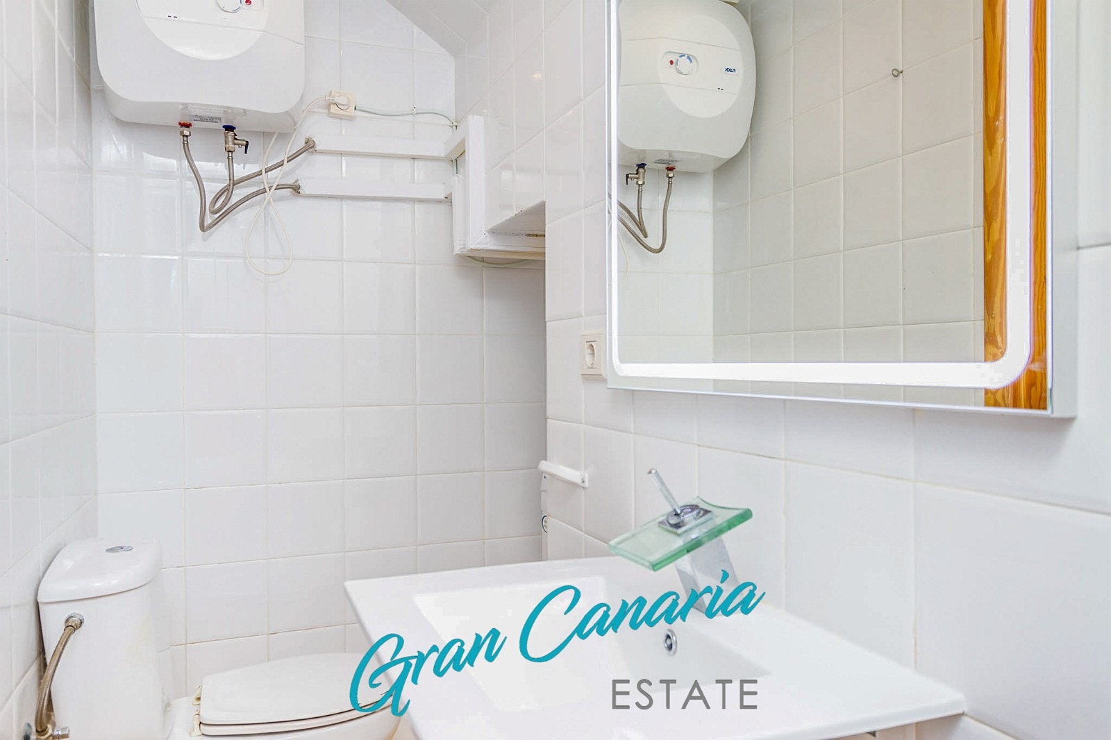 Vaskemaskin rundt hjørnet til høyre Galleribilde