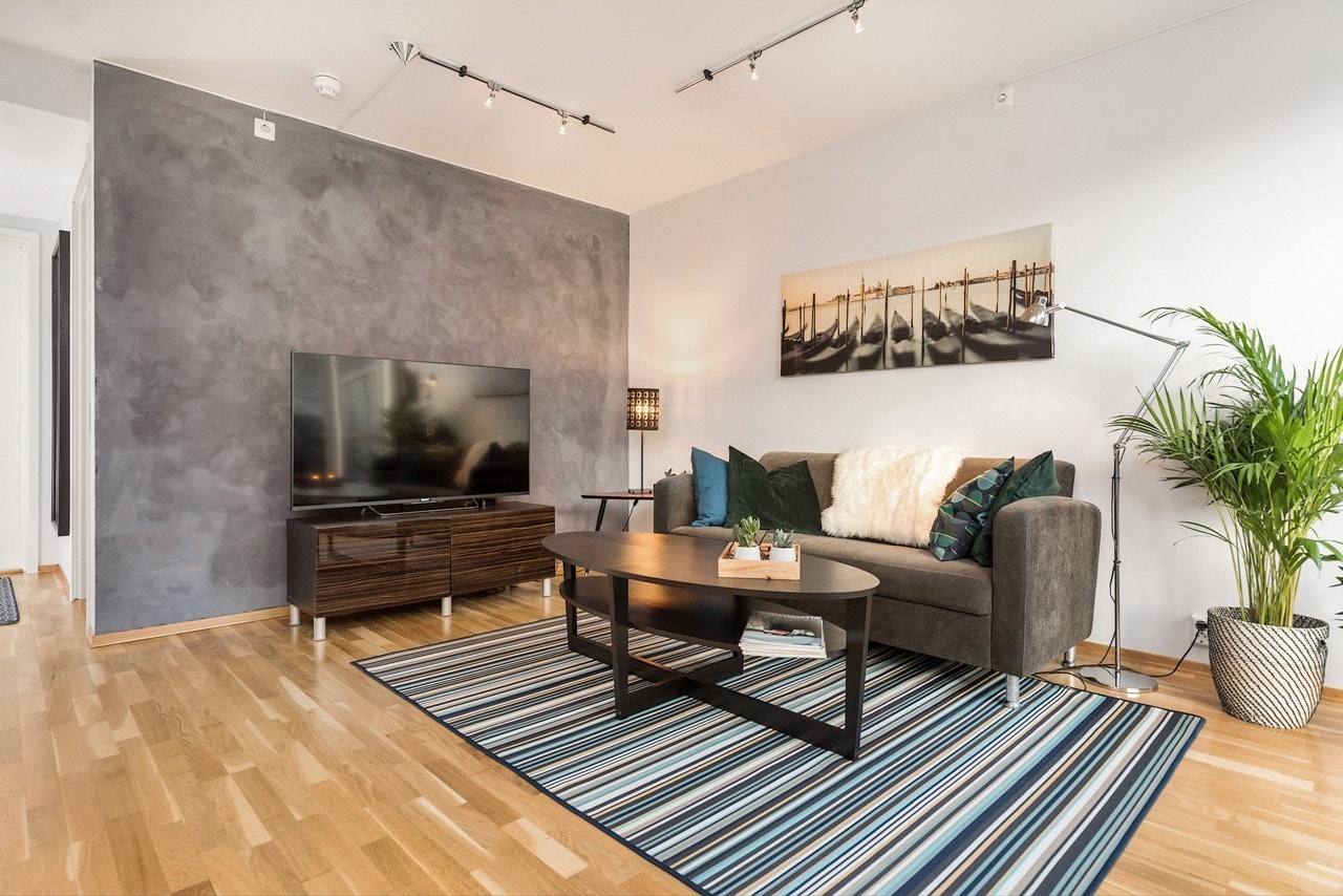 På stuen vil du få plass til en raus sofaseksjon. Gled deg til å invitere venner og familie på kaffebesøk! Galleribilde