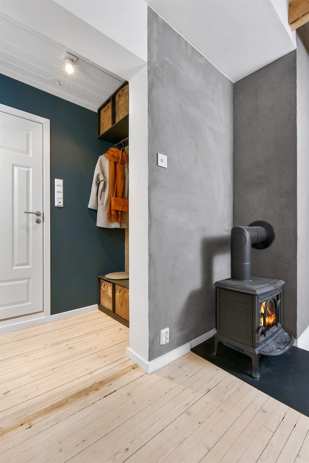 En koselig peis i stuen som gir ekstra varme og hygge. Galleribilde
