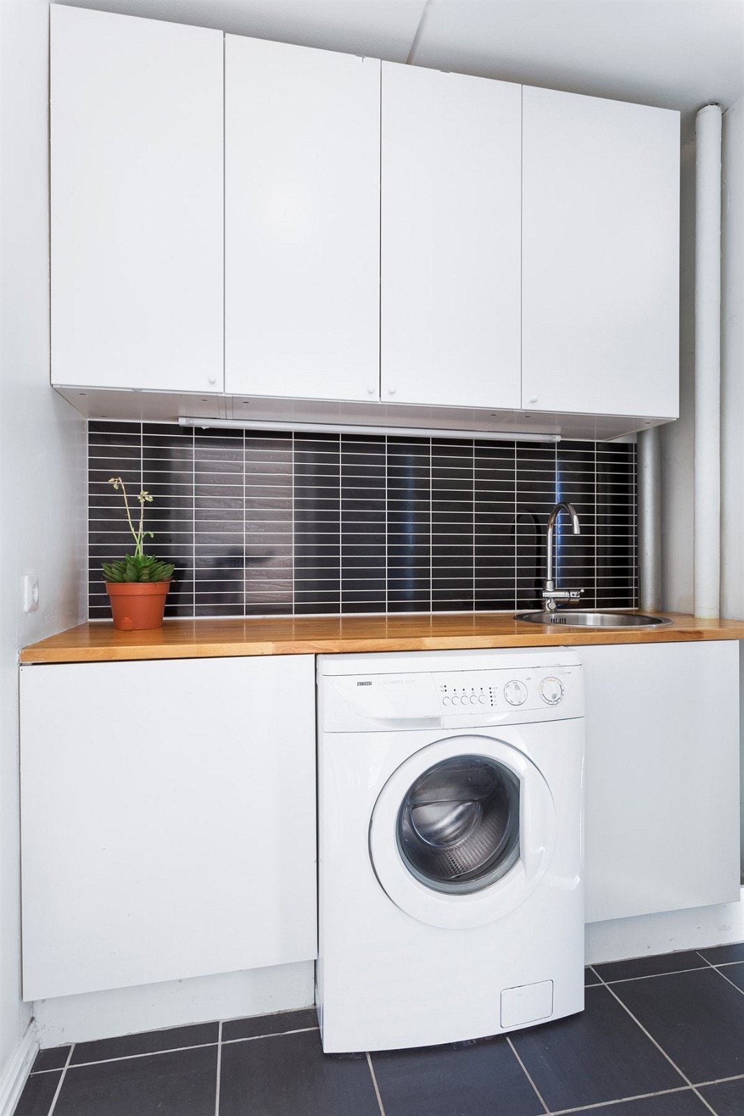 Vaskerom Galleribilde